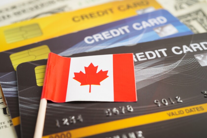 Canada flag on credit card, finance economy trading shopping online business.