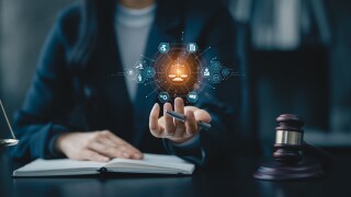 Justice and law concept. Lawyer businesswoman touching on law innovation network icons.