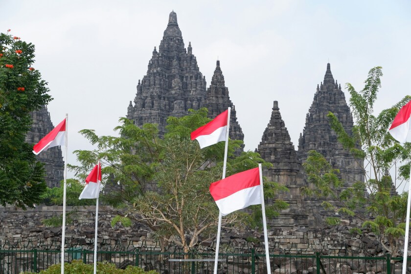 Indonesian flags in front of Prambanan Temple