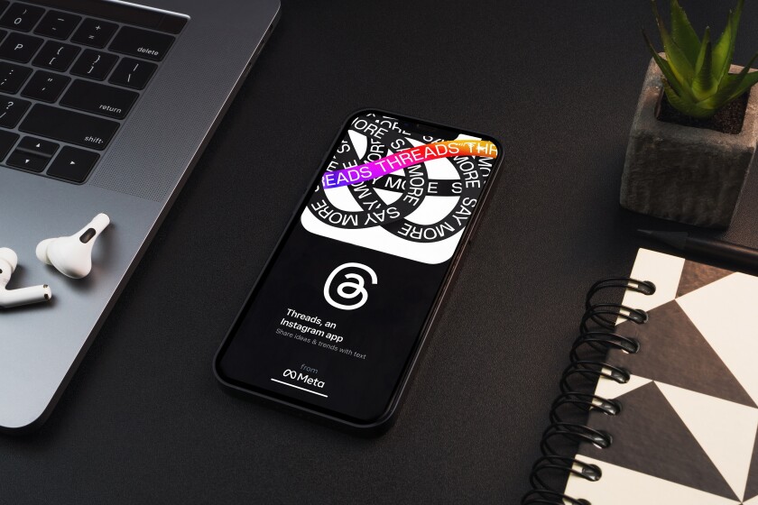Threads Instagram app on the smartphone screen on black backgrou