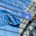 European Union flag against European Parliament