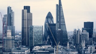City of London business aria view at sunset. View includes Gherkin and modern skyscrapers of leading financial companies