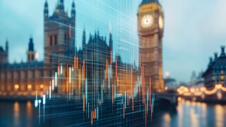 A digital financial chart overlays the blurred image of Big Ben and the Houses of Parliament in London, symbolizing the intersection of finance and politics.