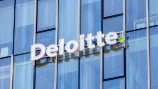 Gdansk, Poland - May 8, 2022: Logo and sign of Deloitte, multina