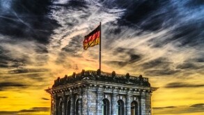 German building with dramatic skyline