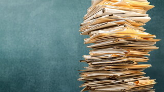 Stack file folders with documents on background