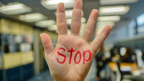 Harassment at work, woman sad angry terrified scared afraid, man, stop no, pressure unhappy male abuse touch hand, flirting bullying uncomfortable job.