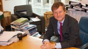 Colin Birss in his office at the Rolls Building in London