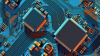 Electronic circuit board close up.