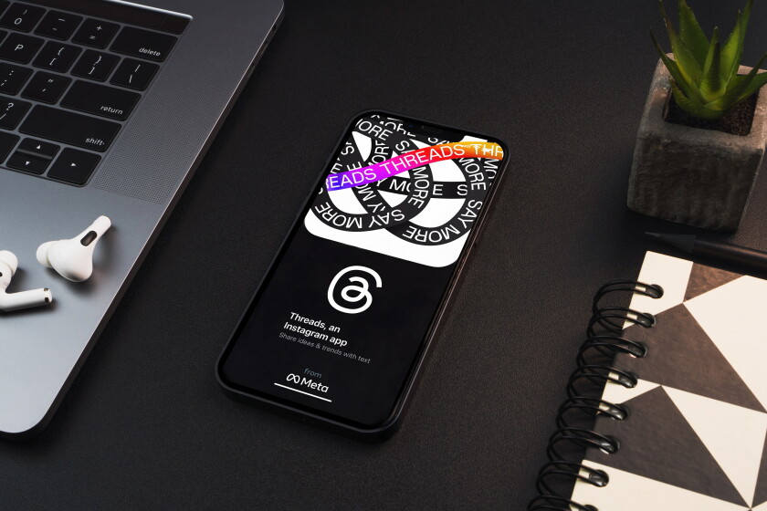 Threads Instagram app on the smartphone screen on black backgrou