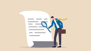 Document checking, agreement or contract validation, financial or budget analysis, search for document files concept, businessman manager holding big magnifying glass checking document paper.