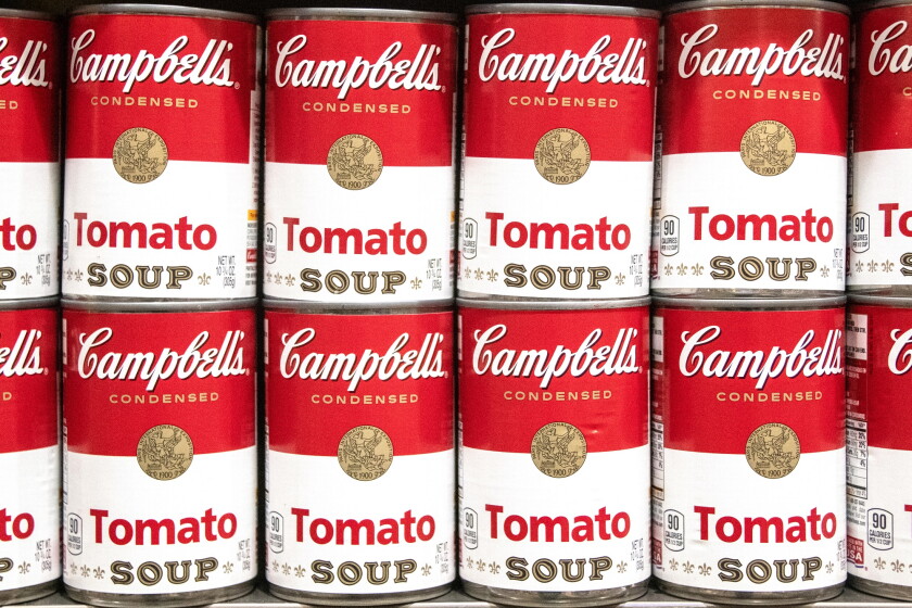 Los Angeles, CA/USA 6-21-2021 Can tins of Campbell's brand tomato soup full frame in a row