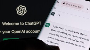ChatGPT chat bot screen seen on smartphone and laptop display wi
