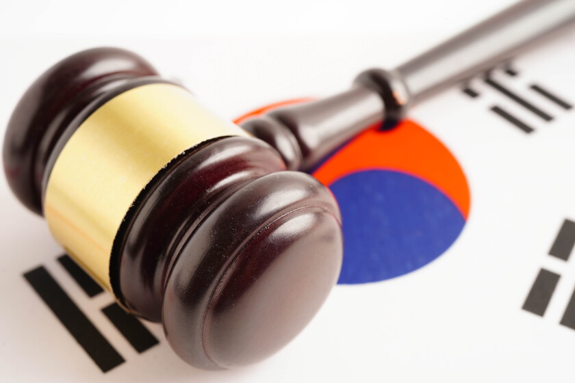Gavel on South Korean flag