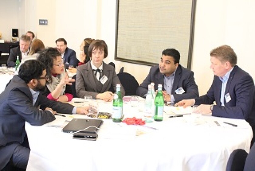 Delegates discuss the impact of artificial intelligence