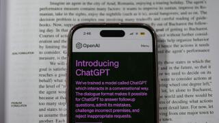 ChatGPT app on top of a book.jpg