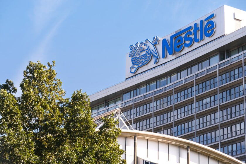 office with logo Nestle, Anglo-Swiss condensed milk company, food manufacturer, instant coffee, chocolate, ice cream, dairy products, baby, pet food, pharmaceuticals, Frankfurt - October 1, 2023
