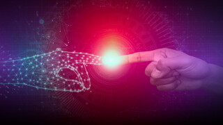 Abstract image of a computer-generated hand touching fingers with a human hand