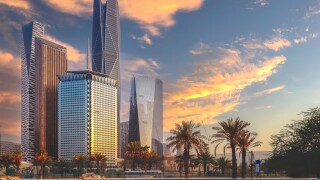 Sunset over large buildings equipped with the latest technology,
