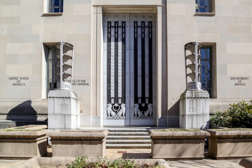 Washington D.C., USA - February 29, 2020: A door of United States Department of Justice(DOJ) on its headquarters building in Washington, D.C. USA.