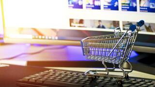 Shopping trolley on computer keyboard.jpg