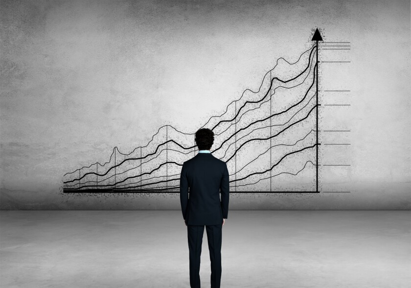 Businessman and chart of investment performance