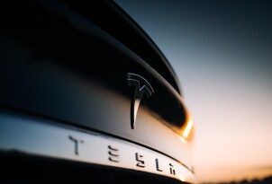 Tesla Model X P100D interior logo at the rear trunk. Elon Musk Tesla motor company bage and logo at the rear part of a car 