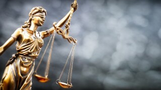 Legal and law concept statue of Lady Justice with scales of just