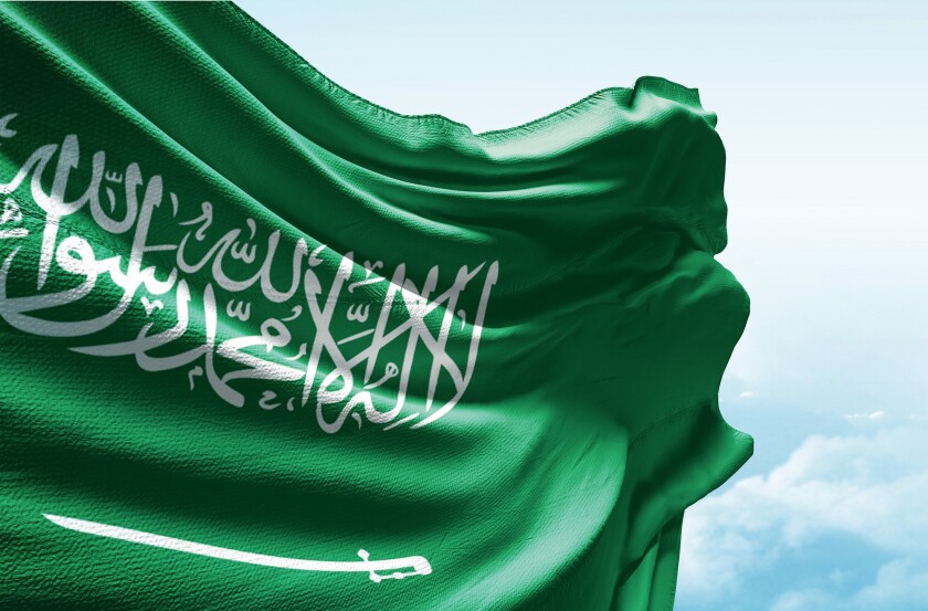 Saudi arabia flag in the blue sky. Horizontal panoramic banner.