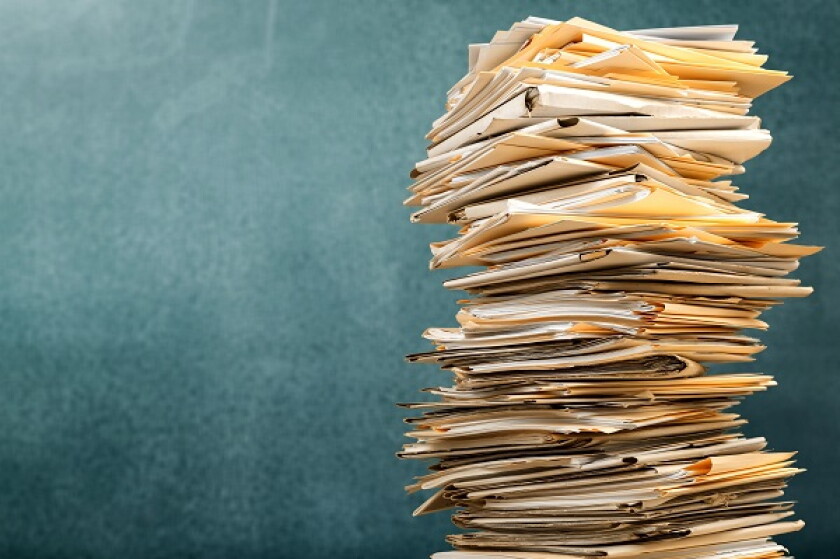 Stack file folders with documents on background