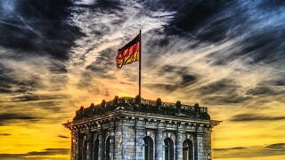 German building with dramatic skyline