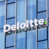 Gdansk, Poland - May 8, 2022: Logo and sign of Deloitte, multina