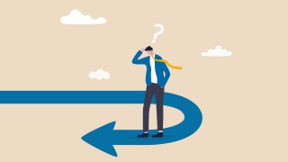 Business turning point, break event or change direction, reverse back, interest rate or financial trend change concept, frustrated businessman investor looking at his reverse direction pathway.