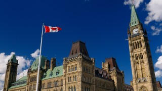 Ottawa Parliament Buildings Center Block with Peace Tower and Canadian flag