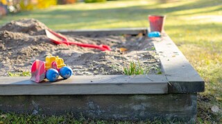 colorful toys at a sandpit at playground