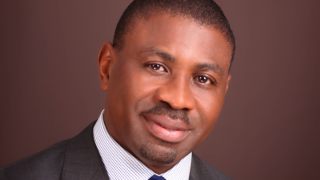 Head shot - Patrick Osu - A&O.png