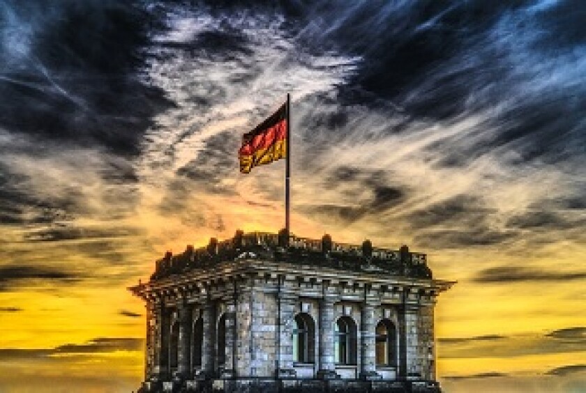 German building with dramatic skyline