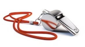 Metal whistle isolated on white