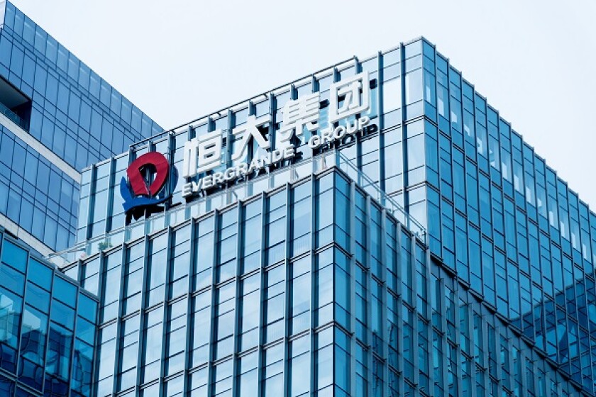 Evergrande logo on office building wall