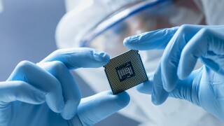 In Ultra Modern Electronic Manufacturing Factory Design Engineer