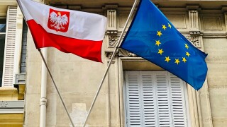 Polish and EU flags on balcony