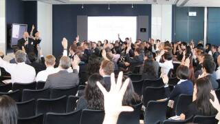 Audience at report presentation