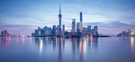 Lujiazui financial district in Shanghai at dusk , China , Asia