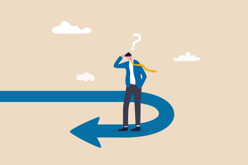 Business turning point, break event or change direction, reverse back, interest rate or financial trend change concept, frustrated businessman investor looking at his reverse direction pathway.