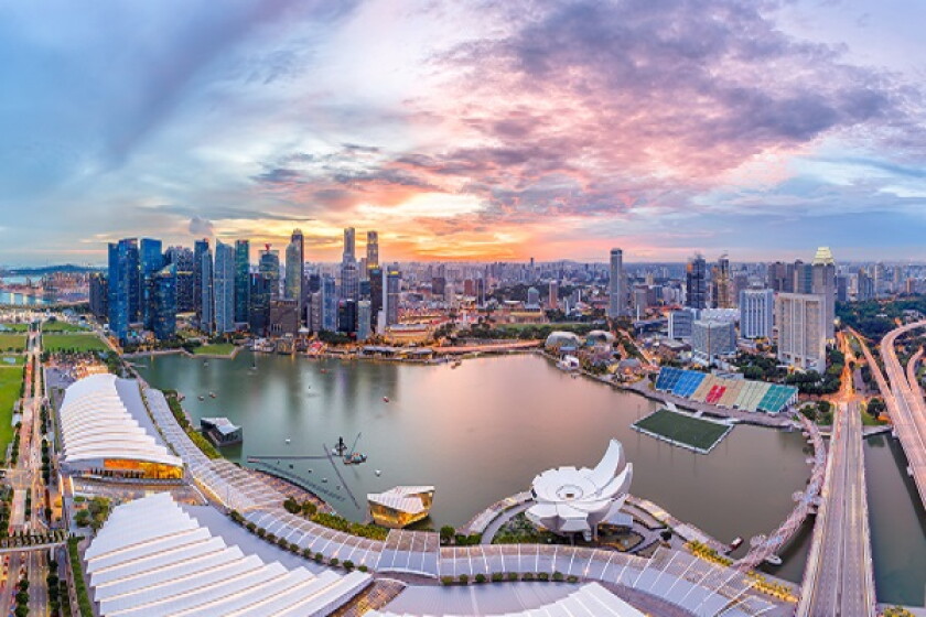 Panorama top view of Singapore City skyline at sunset.