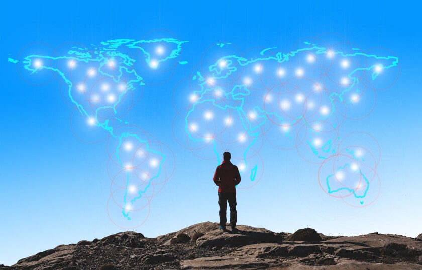 Person viewing map of the world