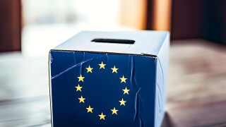 A voting ballot box with the flag of the European Union