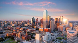 Dallas, Texas cityscape with blue sky at sunset