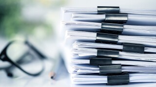 extreamly close up the stacking of office working document with