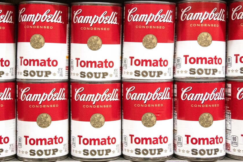 Los Angeles, CA/USA 6-21-2021 Can tins of Campbell's brand tomato soup full frame in a row